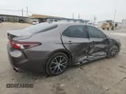 ✅ 2023 Toyota Camry SE • VIN: 4T1T11AK3PU802895 • Лот: 82749565. Опубликован ранее на Copart с пробегом 7 815 миль. Бесплатный доступ к архиву аукционных продаж из США и подробный отчёт об истории автомобиля на DreamBid. Изображение 3.