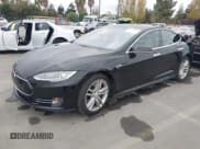 ✅ 2015 Tesla Model S 85 • VIN: 5YJSA1E16FF107254 • Lot: 43741109. Listed on IAAI with 119,933 mi. Free auction sales archive from the USA and detailed vehicle history report at DreamBid. Image 2.