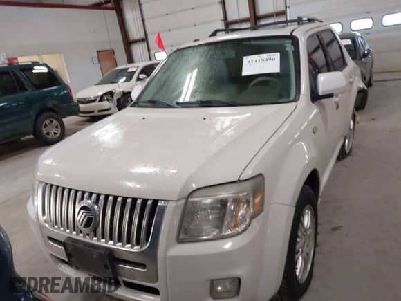 2009 Mercury Mariner Premier with VIN 4M2CU97729KJ00086, listed as a IAAI auction lot 41418490 with 167,486 mi miles and . Bid and sale history available at DreamBid. Image 12.
