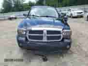 2006 Dodge Dakota SLT with VIN 1D7HE48K66S687229, listed as a Copart auction lot 56238735 with 148,785 mi miles and Salvage title. Bid and sale history available at DreamBid. Image 5.