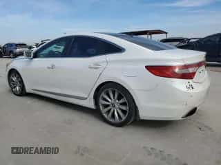 2013 Hyundai Azera with VIN KMHFH4JGXDA245793, listed as a Copart auction lot 82435324 with 144,269 mi miles and Clean title. Bid and sale history available at DreamBid. Image 2.