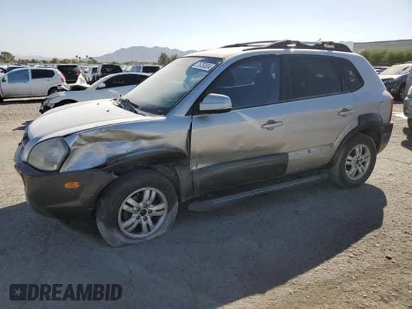 2006 Hyundai Tucson GLS z VIN KM8JN12D46U430686, wystawiony jako Copart lot #76763504 z przebiegiem 145 104 mil mil oraz Szkoda całkowita • Salvage title. Historia ofert i sprzedaży dostępna na DreamBid. Obrazek 1.
