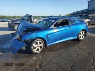 ✅ 2005 Hyundai Tiburon GS • VIN: KMHHM65D15U174581 • Лот: 84207865. Опубликован ранее на Copart с пробегом 203 268 миль. Бесплатный доступ к архиву аукционных продаж из США и подробный отчёт об истории автомобиля на DreamBid. Изображение 1.