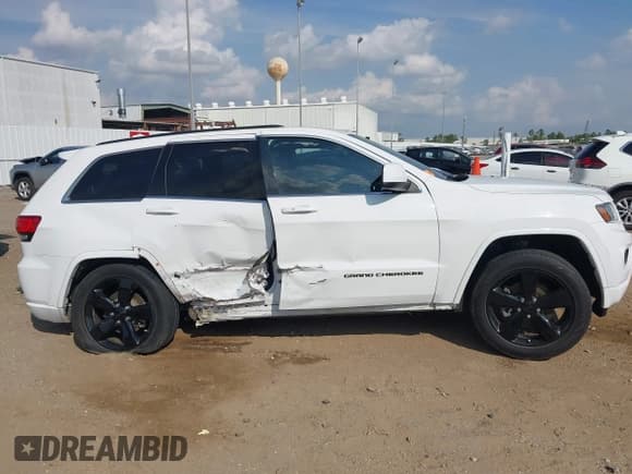 ✅ 2015 Jeep Grand Cherokee Laredo • VIN: 1C4RJEAG5FC957244 • Lot: 43530457. Wystawiony na IAAI z przebiegiem 93 671 mil. Bezpłatny archiwum sprzedaży aukcyjnych z USA i szczegółowy raport historii pojazdu na DreamBid. Zdjęcie 14.