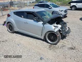 ✅ 2013 Hyundai Veloster Turbo • VIN: KMHTC6AE7DU167385 • Lot: 42569711. Listed on IAAI with 130,526 mi. Free auction sales archive from the USA and detailed vehicle history report at DreamBid. Image 1.