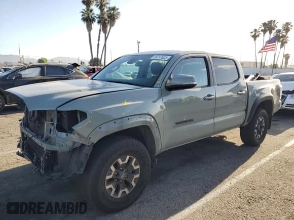 ✅ 2023 Toyota Tacoma SR • VIN: 3TMCZ5AN2PM564332 • Lot: 56237625. Listed on Copart with 82,789 mi. Free auction sales archive from the USA and detailed vehicle history report at DreamBid. Image 1.