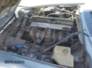 ✅ 1995 Jaguar XJS • VIN: SAJNX2747SC197919 • Лот: 52284585. Опубликован ранее на Copart с пробегом 99 707 миль. Бесплатный доступ к архиву аукционных продаж из США и подробный отчёт об истории автомобиля на DreamBid. Изображение 11.