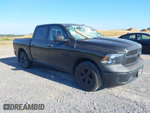 ✅ 2021 Ram 1500 Tradesman • VIN: 3C6RR6KG7MG711682 • Lot: 43319178. Listed on IAAI with 66,586 mi. Free auction sales archive from the USA and detailed vehicle history report at DreamBid. Image 1.