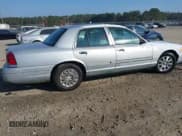 ✅ 2003 Ford Crown Victoria Standard • VIN: 2FAFP73W03X182860 • Lot: 43716227. Listed on IAAI with 139,352 mi. Free auction sales archive from the USA and detailed vehicle history report at DreamBid. Image 4.