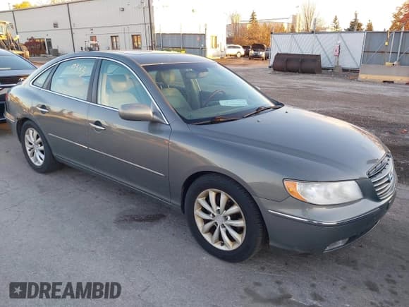 ✅ 2007 Hyundai Azera SE • VIN: KMHFC46F77A194403 • Lot: 43650343. Listed on IAAI with 148,624 mi. Free auction sales archive from the USA and detailed vehicle history report at DreamBid. Image 1.