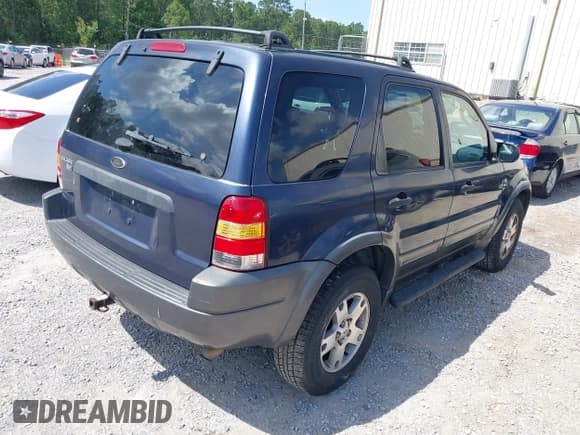 ✅ 2004 Ford Escape XLT • VIN: 1FMYU031X4KB75065 • Lot: 42238562. Listed on IAAI with 195,440 mi. Free auction sales archive from the USA and detailed vehicle history report at DreamBid. Image 4.