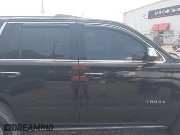 ✅ 2015 Chevrolet Tahoe LTZ • VIN: 1GNSCCKC8FR121461 • Lot: 42407901. Listed on IAAI with 137,729 mi. Free auction sales archive from the USA and detailed vehicle history report at DreamBid. Image 14.