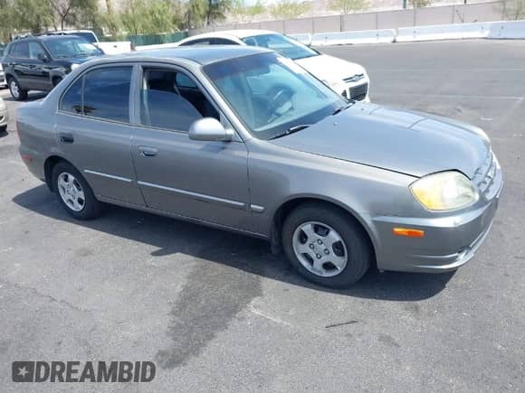 2003 Hyundai Accent GL with VIN KMHCG45C73U471607, listed as a IAAI auction lot 41956551 with 222,305 mi miles and . Bid and sale history available at DreamBid. Image 1.
