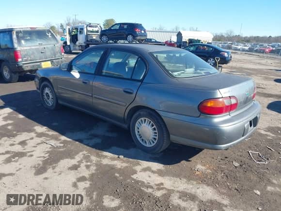 2003 Chevrolet Malibu z VIN 1G1ND52J53M723359, wystawiony jako IAAI lot #41314588 z przebiegiem 166 368 mil mil oraz . Historia ofert i sprzedaży dostępna na DreamBid. Obrazek 3.