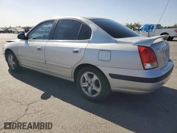 2003 Hyundai Elantra GLS z VIN KMHDN45D33U629413, wystawiony jako Copart lot #78414854 z przebiegiem 195 266 mil mil oraz Szkoda całkowita • Salvage title. Historia ofert i sprzedaży dostępna na DreamBid. Obrazek 2.