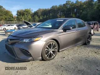 2020 Toyota Camry Hybrid SE z VIN 4T1G31AK0LU012573, wystawiony jako Copart lot #85478245 z przebiegiem 68 865 mil mil oraz Szkoda całkowita • Salvage title. Historia ofert i sprzedaży dostępna na DreamBid. Obrazek 1.