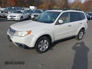 ✅ 2012 Subaru Forester X Premium • VIN: JF2SHADC7CH422866 • Lot: 43611387. Listed on IAAI with 217,353 mi. Free auction sales archive from the USA and detailed vehicle history report at DreamBid. Image 2.