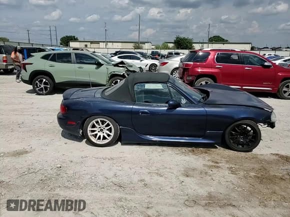 ✅ 2002 Mazda MX-5 Miata Cloth • VIN: JM1NB353020233254 • Lot: 64454524. Listed on Copart with 77,959 mi. Free auction sales archive from the USA and detailed vehicle history report at DreamBid. Image 11.