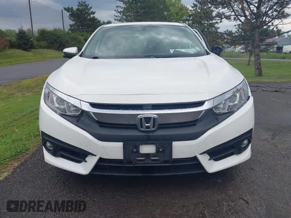 ✅ 2018 Honda Civic EX-T • VIN: JHMFC1F3XJX002306 • Lot: 43149201. Listed on IAAI with 77,470 mi. Free auction sales archive from the USA and detailed vehicle history report at DreamBid. Image 12.