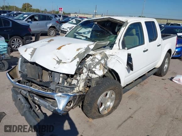 ✅ 2008 Nissan Frontier SE • VIN: 1N6AD07U58C450087 • Lot: 43608979. Listed on IAAI with 155,704 mi. Free auction sales archive from the USA and detailed vehicle history report at DreamBid. Image 2.