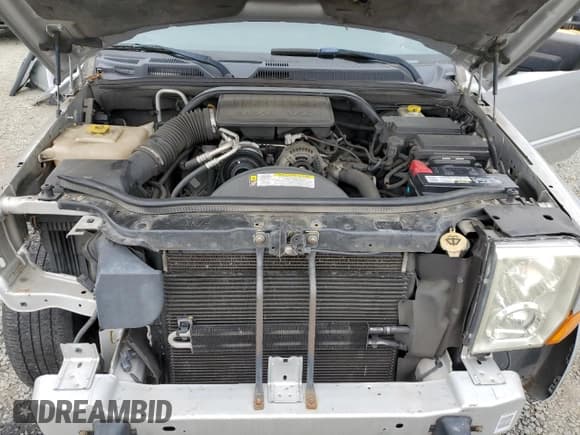 ✅ 2010 Jeep Commander Sport • VIN: 1J4RG4GK2AC121821 • Lot: 57793545. Listed on Copart with 171,405 mi. Free auction sales archive from the USA and detailed vehicle history report at DreamBid. Image 12.