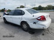 ✅ 2005 Ford Taurus SE • VIN: 1FAFP53215A244179 • Lot: 82070545. Listed on Copart with 105,426 mi. Free auction sales archive from the USA and detailed vehicle history report at DreamBid. Image 2.