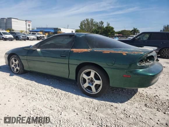 1997 Chevrolet Camaro Z28 z VIN 2G1FP22P0V2107947, wystawiony jako Copart lot #43237785 z przebiegiem Nie podano mil oraz Czysty tytuł • Clean title. Historia ofert i sprzedaży dostępna na DreamBid. Obrazek 2.