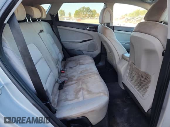 2018 Hyundai Tucson SEL z VIN KM8J33A43JU609068, wystawiony jako Copart lot #89866985 z przebiegiem 171 397 mil mil oraz Czysty tytuł • Clean title. Historia ofert i sprzedaży dostępna na DreamBid. Obrazek 11.