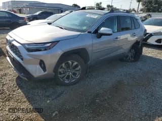 ✅ 2022 Toyota RAV4 Hybrid Limited • VIN: 4T3D6RFV0NU065828 • Lot: 68023355. Listed on Copart with 49,970 mi. Free auction sales archive from the USA and detailed vehicle history report at DreamBid. Image 1.
