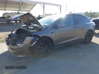 ✅ 2016 Tesla Model X 70D • VIN: 5YJXCBE20GF002726 • Лот: 43592255. Опубликован ранее на IAAI с пробегом 104 514 миль. Бесплатный доступ к архиву аукционных продаж из США и подробный отчёт об истории автомобиля на DreamBid. Изображение 2.