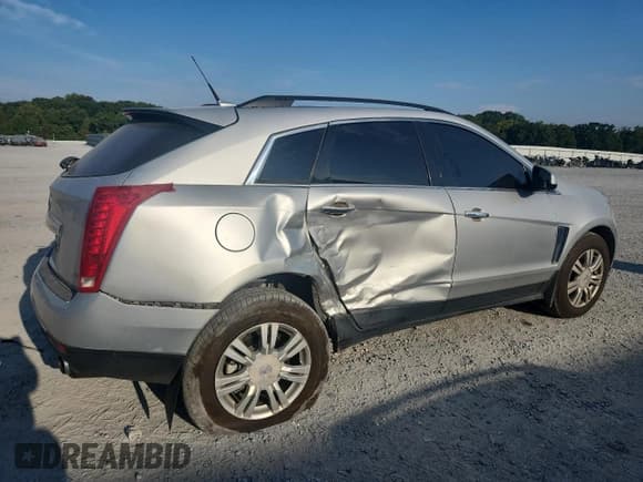 ✅ 2014 Cadillac SRX • VIN: 3GYFNAE39ES657541 • Lot: 81586465. Listed on Copart with 158,581 mi. Free auction sales archive from the USA and detailed vehicle history report at DreamBid. Image 3.