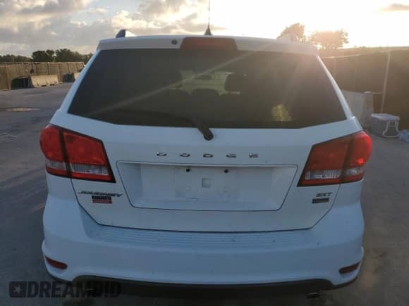 2015 Dodge Journey SXT z VIN 3C4PDCBG2FT610363, wystawiony jako Copart lot #86847885 z przebiegiem 128 271 mil mil oraz Szkoda całkowita • Salvage title. Historia ofert i sprzedaży dostępna na DreamBid. Obrazek 6.