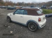 ✅ 2009 MINI Convertible S • VIN: WMWMS33539TG89385 • Lot: 82756675. Listed on Copart with 96,228 mi. Free auction sales archive from the USA and detailed vehicle history report at DreamBid. Image 2.