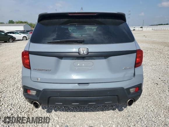 ✅ 2022 Honda Passport EX-L • VIN: 5FNYF8H52NB031405 • Lot: 57150355. Listed on Copart with 55,152 mi. Free auction sales archive from the USA and detailed vehicle history report at DreamBid. Image 6.