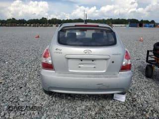 ✅ 2009 Hyundai Accent GS • VIN: KMHCM36C69U121900 • Лот: 61919255. Опубликован ранее на Copart с пробегом 100 702 миль. Бесплатный доступ к архиву аукционных продаж из США и подробный отчёт об истории автомобиля на DreamBid. Изображение 6.