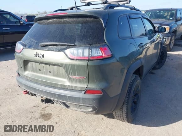 ✅ 2021 Jeep Cherokee Trailhawk • VIN: 1C4PJMBX9MD125087 • Lot: 41780564. Listed on IAAI with 75,212 mi. Free auction sales archive from the USA and detailed vehicle history report at DreamBid. Image 4.