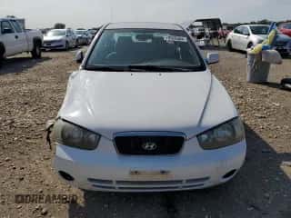 2002 Hyundai Elantra GLS z VIN KMHDN45D72U321899, wystawiony jako Copart lot #70520504 z przebiegiem 210 610 mil mil oraz Szkoda całkowita • Salvage title. Historia ofert i sprzedaży dostępna na DreamBid. Obrazek 5.