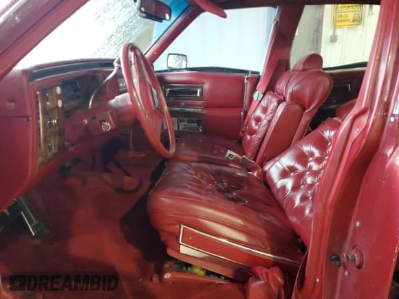 ✅ 1987 Cadillac Brougham • VIN: 1G6DW51Y8H9760303 • Lot: 59555665. Wystawiony na Copart z przebiegiem 34 784 mil. Bezpłatny archiwum sprzedaży aukcyjnych z USA i szczegółowy raport historii pojazdu na DreamBid. Zdjęcie 7.