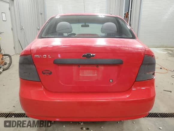 2004 Chevrolet Aveo LS z VIN KL1TJ52614B258568, wystawiony jako Copart lot #84412874 z przebiegiem 150 051 mil mil oraz Czysty tytuł • Clean title. Historia ofert i sprzedaży dostępna na DreamBid. Obrazek 6.