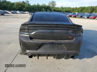 ✅ 2018 Dodge Charger Daytona 392 • VIN: 2C3CDXGJ2JH200582 • Lot: 64552765. Wystawiony na Copart z przebiegiem 65 221 mil. Bezpłatny archiwum sprzedaży aukcyjnych z USA i szczegółowy raport historii pojazdu na DreamBid. Zdjęcie 6.