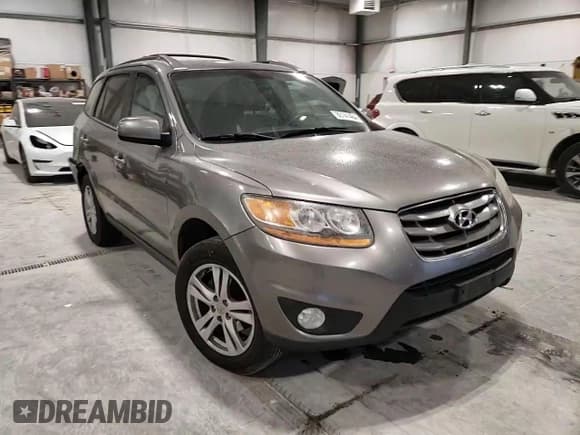 ✅ 2011 Hyundai Santa Fe SE • VIN: 5XYZHDAG4BG005119 • Lot: 85141464. Listed on Copart with 186,384 mi. Free auction sales archive from the USA and detailed vehicle history report at DreamBid. Image 12.