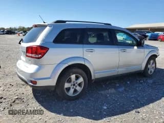 ✅ 2012 Dodge Journey SXT • VIN: 3C4PDCBG8CT238684 • Лот: 87369725. Опубликован ранее на Copart с пробегом 103 418 миль. Бесплатный доступ к архиву аукционных продаж из США и подробный отчёт об истории автомобиля на DreamBid. Изображение 3.