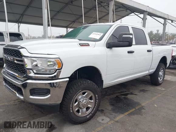 ✅ 2023 Ram 2500 Tradesman • VIN: 3C6UR5CJ6PG519561 • Лот: 43544964. Опубликован ранее на IAAI с пробегом 23 624 миль. Бесплатный доступ к архиву аукционных продаж из США и подробный отчёт об истории автомобиля на DreamBid. Изображение 2.