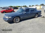 ✅ 1996 Lincoln Town Car Executive • VIN: 1LNLM81W9TY728954 • Lot: 85326925. Listed on Copart with 356,596 mi. Free auction sales archive from the USA and detailed vehicle history report at DreamBid. Image 1.
