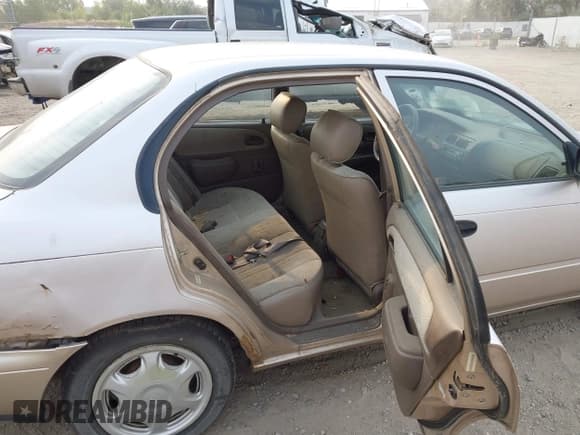 ✅ 1997 Toyota Corolla CE • VIN: 1NXBA02EXVZ612944 • Lot: 43127380. Wystawiony na IAAI z przebiegiem 230 755 mil. Bezpłatny archiwum sprzedaży aukcyjnych z USA i szczegółowy raport historii pojazdu na DreamBid. Zdjęcie 8.