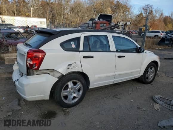 2007 Dodge Caliber SXT с VIN 1B3HB48B77D300293, выставлен на аукционе Copart как лот 79722304 с пробегом 200 113 миль миль и Списание • Salvage title. История ставок и продаж доступна на DreamBid. Изображение 3.