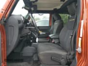 ✅ 2014 Jeep Wrangler Unlimited Sahara • VIN: 1C4BJWEG8EL188254 • Лот: 82111935. Опубликован ранее на Copart с пробегом 146 326 миль. Бесплатный доступ к архиву аукционных продаж из США и подробный отчёт об истории автомобиля на DreamBid. Изображение 7.