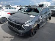 ✅ 2023 Kia Sportage X-Line • VIN: 5XYK6CAF1PG033864 • Lot: 43388537. Wystawiony na IAAI z przebiegiem 53 961 mil. Bezpłatny archiwum sprzedaży aukcyjnych z USA i szczegółowy raport historii pojazdu na DreamBid. Zdjęcie 2.