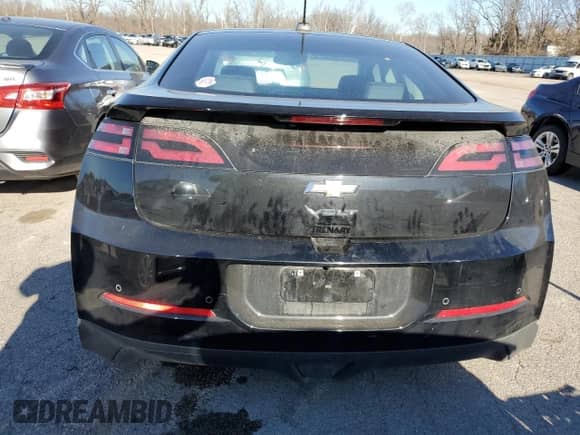 2015 Chevrolet Volt z VIN 1G1RB6E48FU106447, wystawiony jako Copart lot #79871573 z przebiegiem 76 824 mil mil oraz . Historia ofert i sprzedaży dostępna na DreamBid. Obrazek 6.