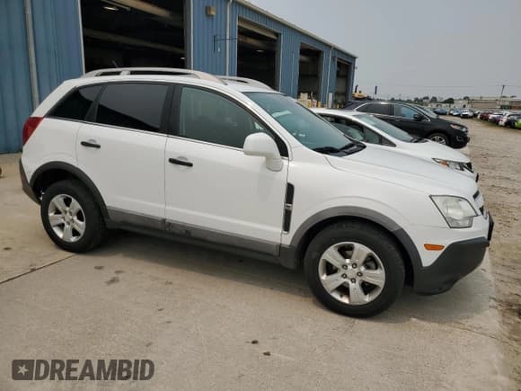 ✅ 2013 Chevrolet Captiva Sport LS • VIN: 3GNAL2EK6DS592656 • Lot: 59178735. Wystawiony na Copart z przebiegiem 92 935 mil. Bezpłatny archiwum sprzedaży aukcyjnych z USA i szczegółowy raport historii pojazdu na DreamBid. Zdjęcie 4.